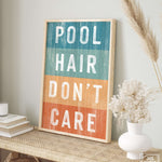 a picture of a sign that says pool hair don't care