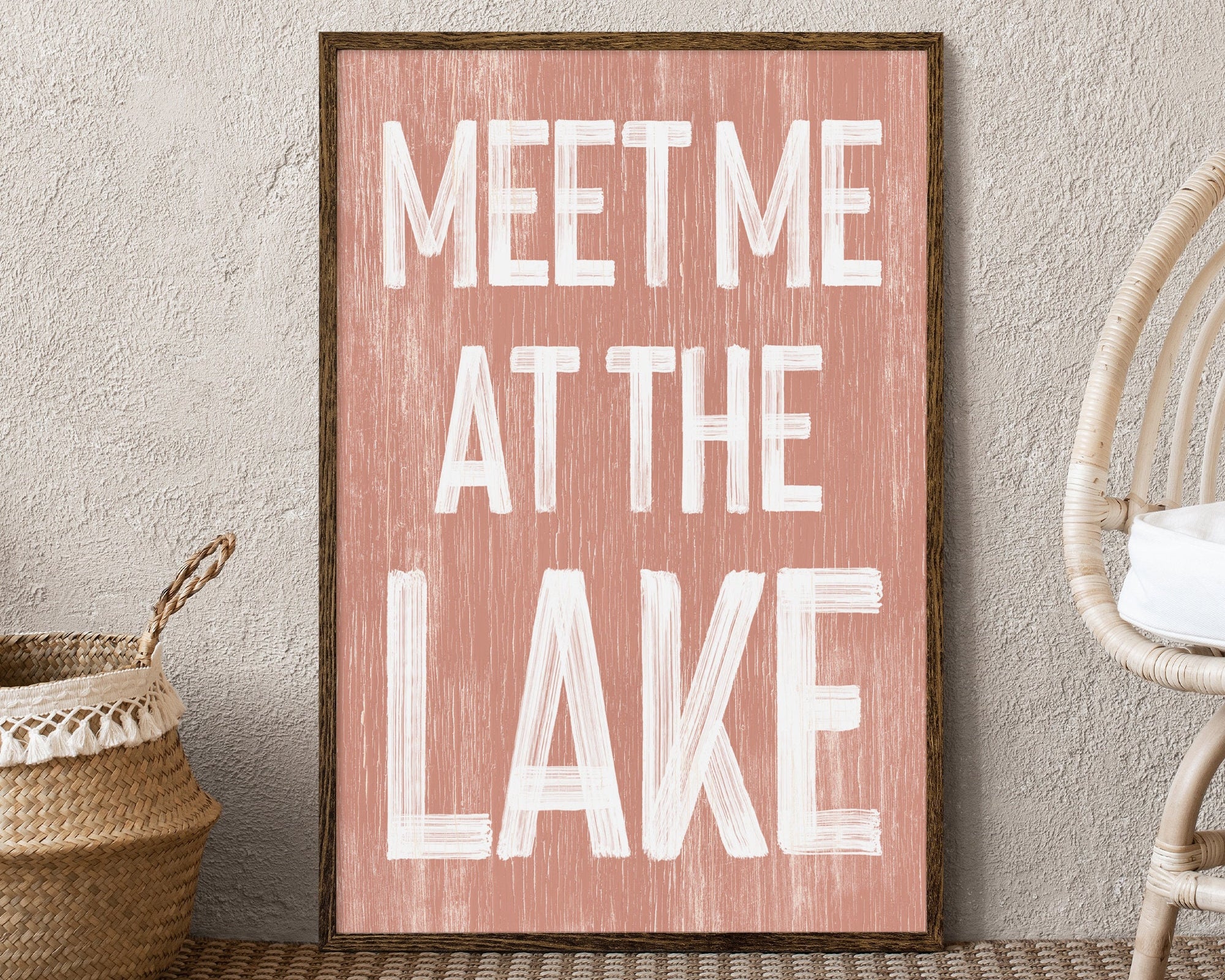 The Meet Me at the Lake Sign, Coral, features bold white lettering and makes perfect lake house decor with a modern farmhouse vibe.