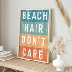 a picture of a sign that says beach hair don't care