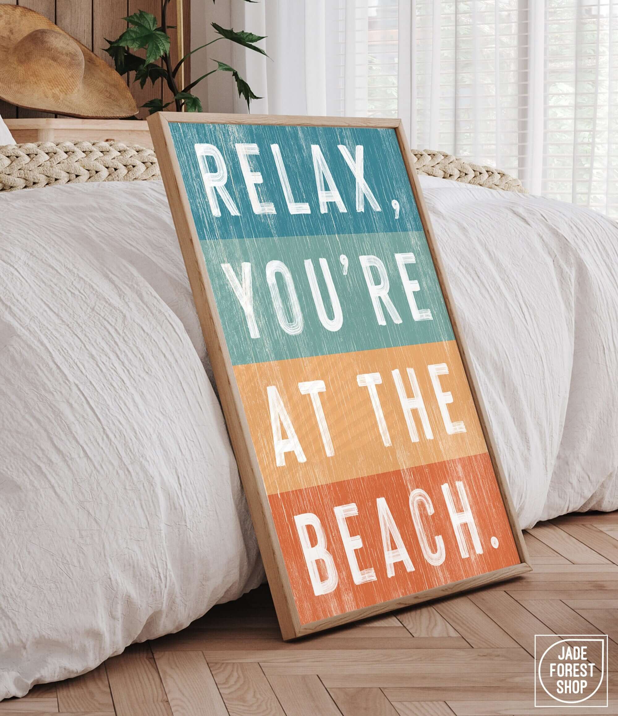 a wooden sign that says relax, you're at the beach