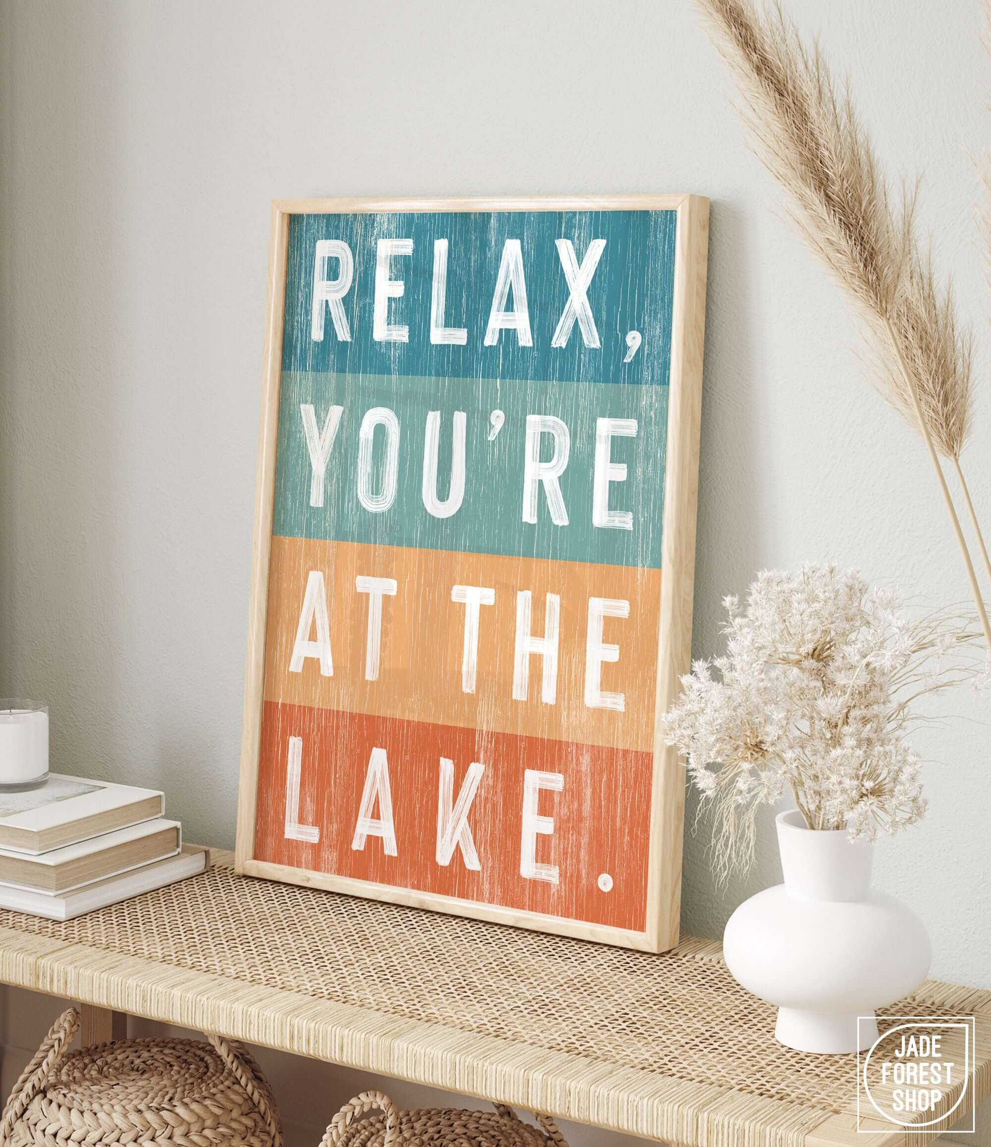 a sign that says relax, you're at the lake