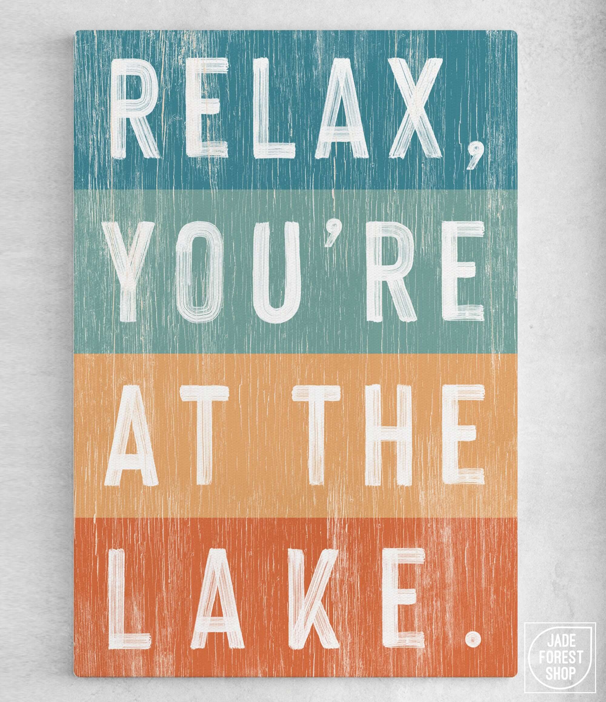 a sign that says relax, you're at the lake