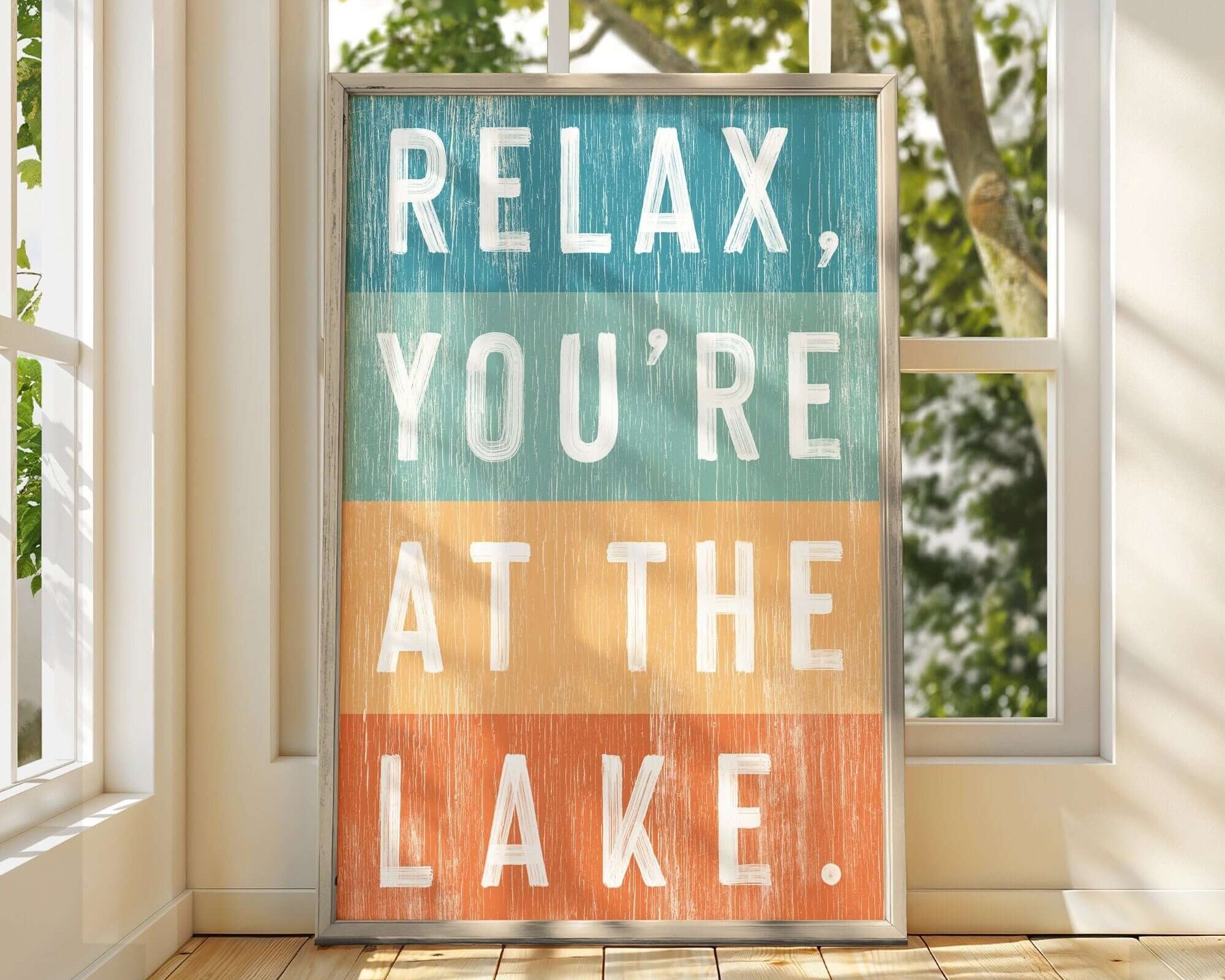 a sign that reads relax you're at the lake