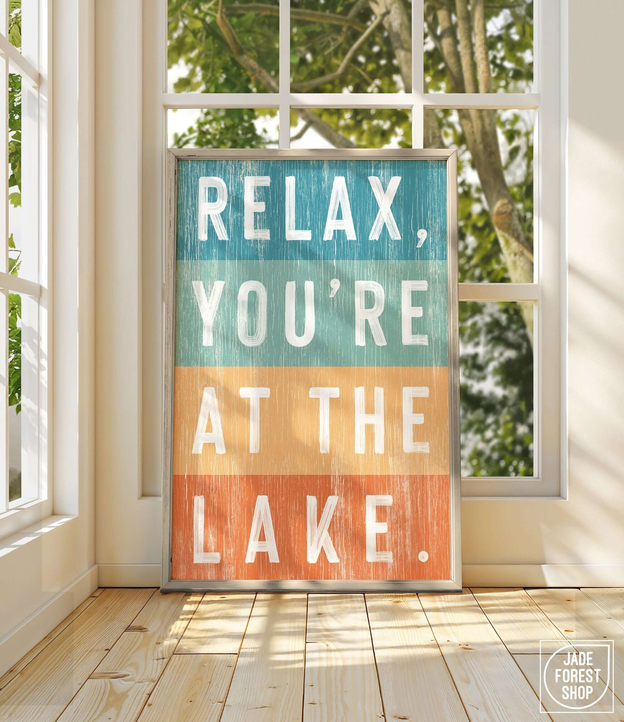 a sign that reads relax you're at the lake