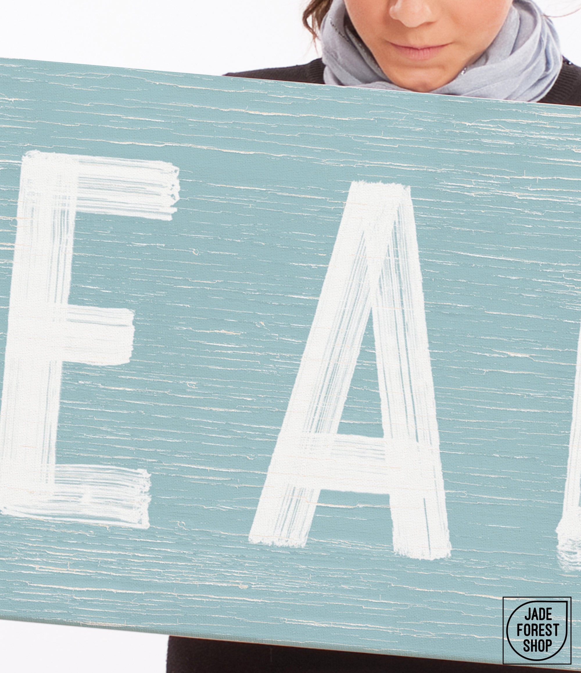 a woman holding a sign that says eat