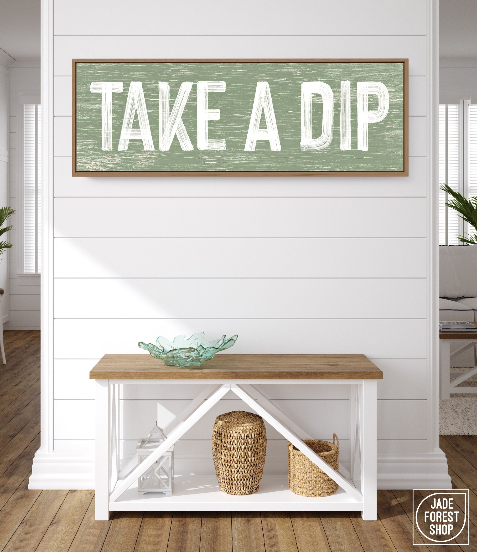 a wooden sign that says take a dip on a wall