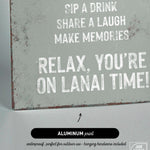 a sign that says relax you're on lanai time