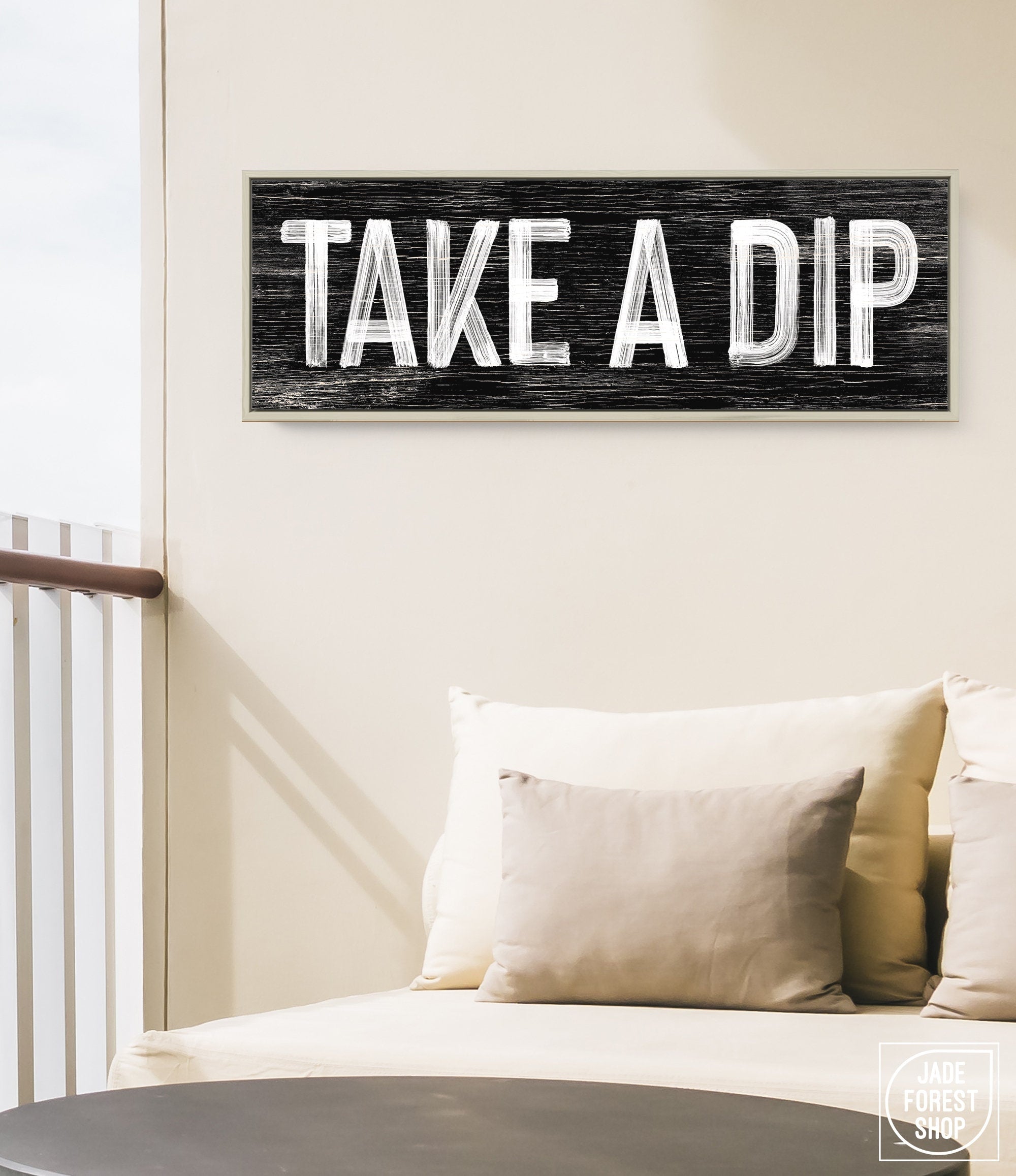 a sign that says take a dip on a wall