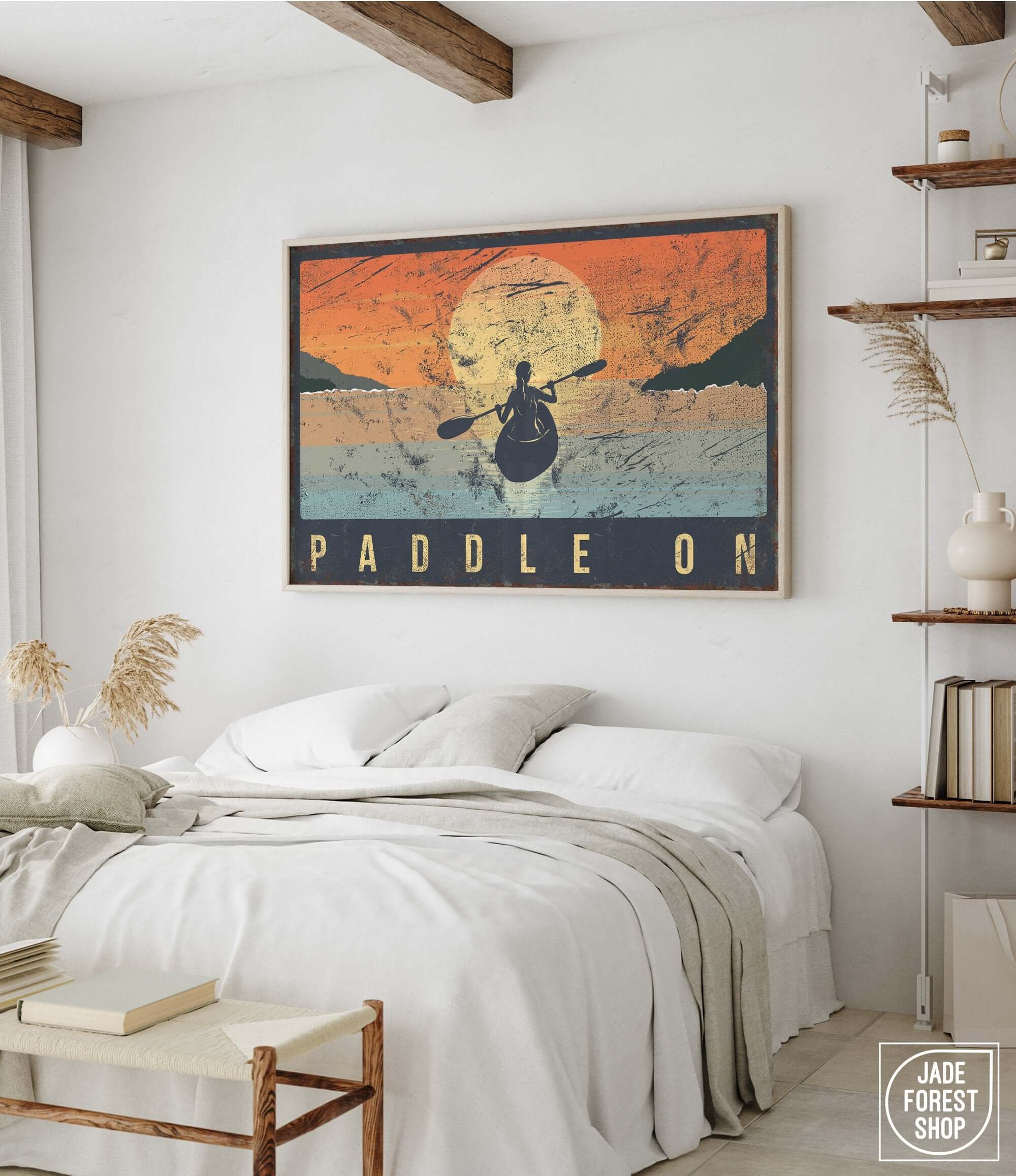 a bedroom with a bed and a poster on the wall