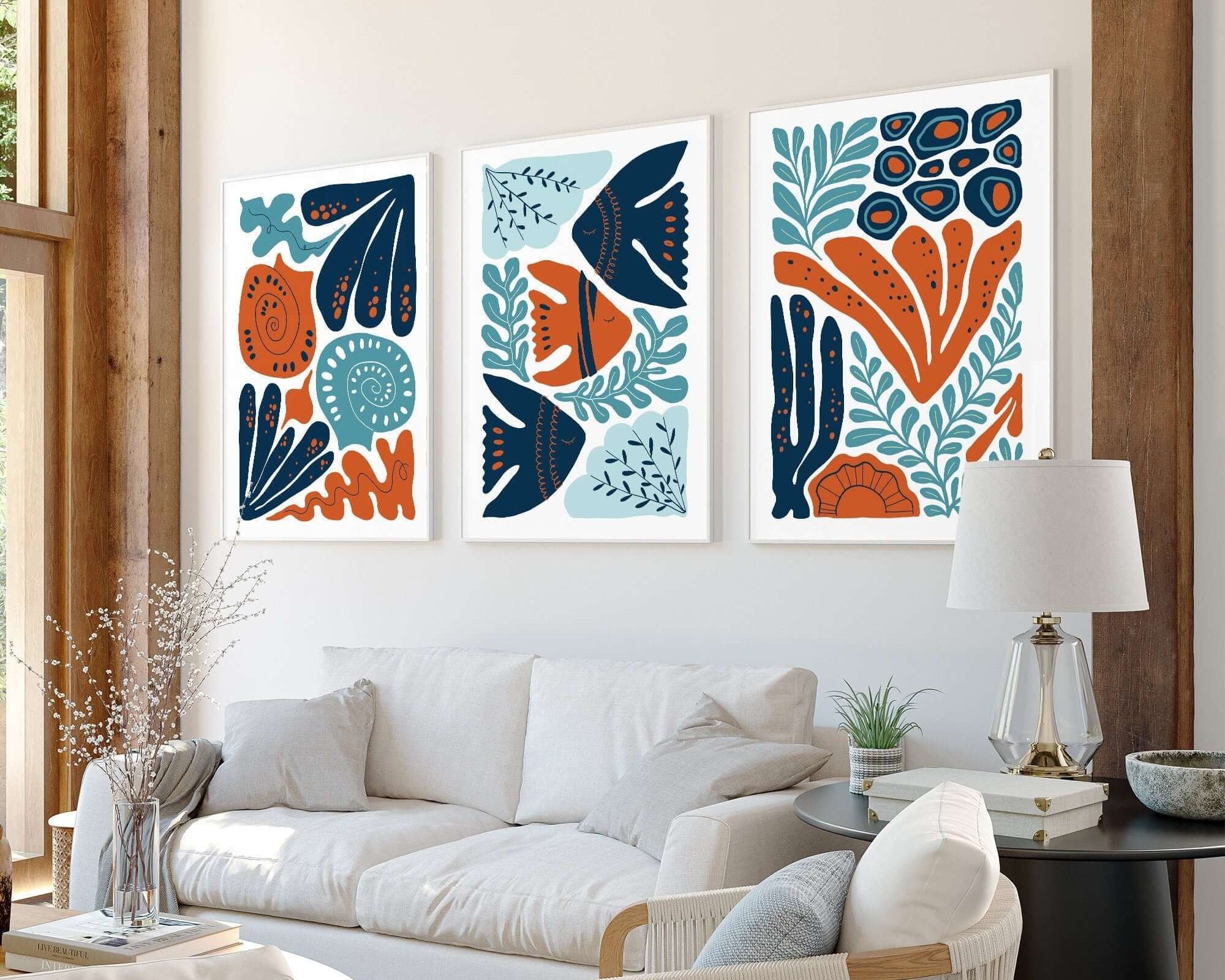 Bright living room with modern furniture and the Ocean Blocks Triptych (Set of Three Prints | 326) above the sofa, adding a vibrant touch to elevate your home decor.