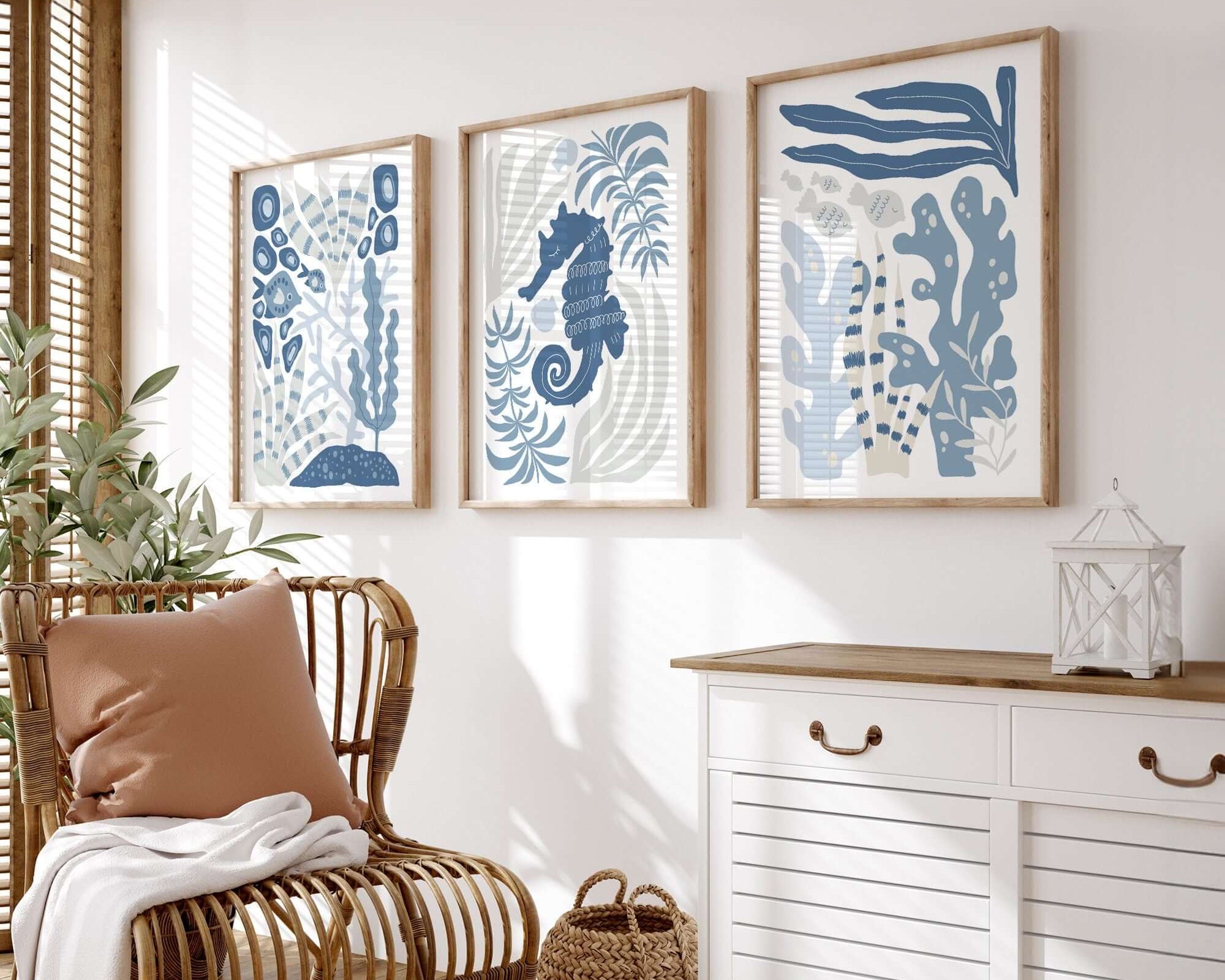 A rattan chair and white sideboard pair perfectly with the Ocean Blocks Triptych | Set of Three Prints | 351, creating inviting home decor on a sunny wall.