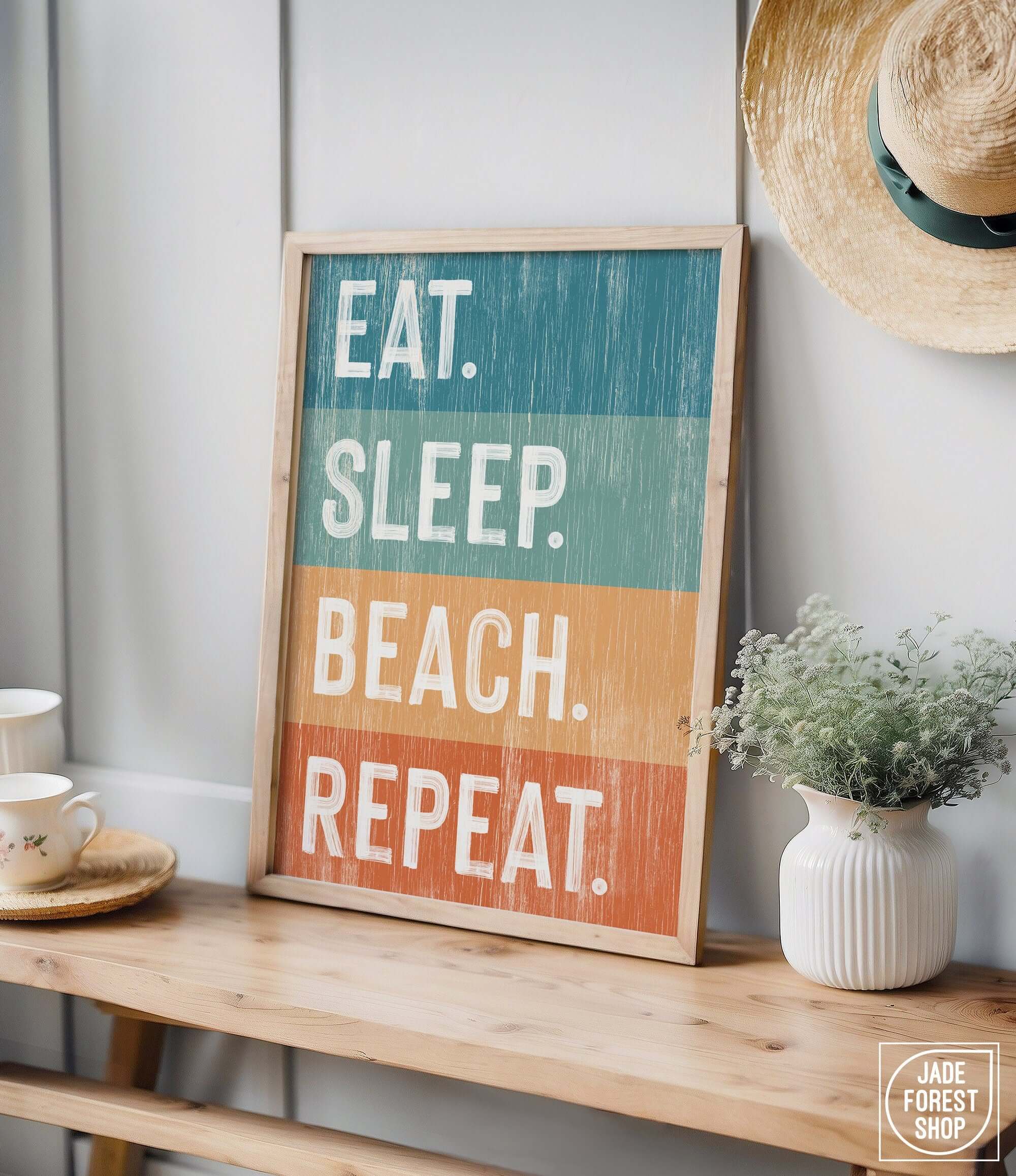 a sign that says eat sleep beach repeat