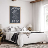 a bedroom with a large bed and a poster on the wall