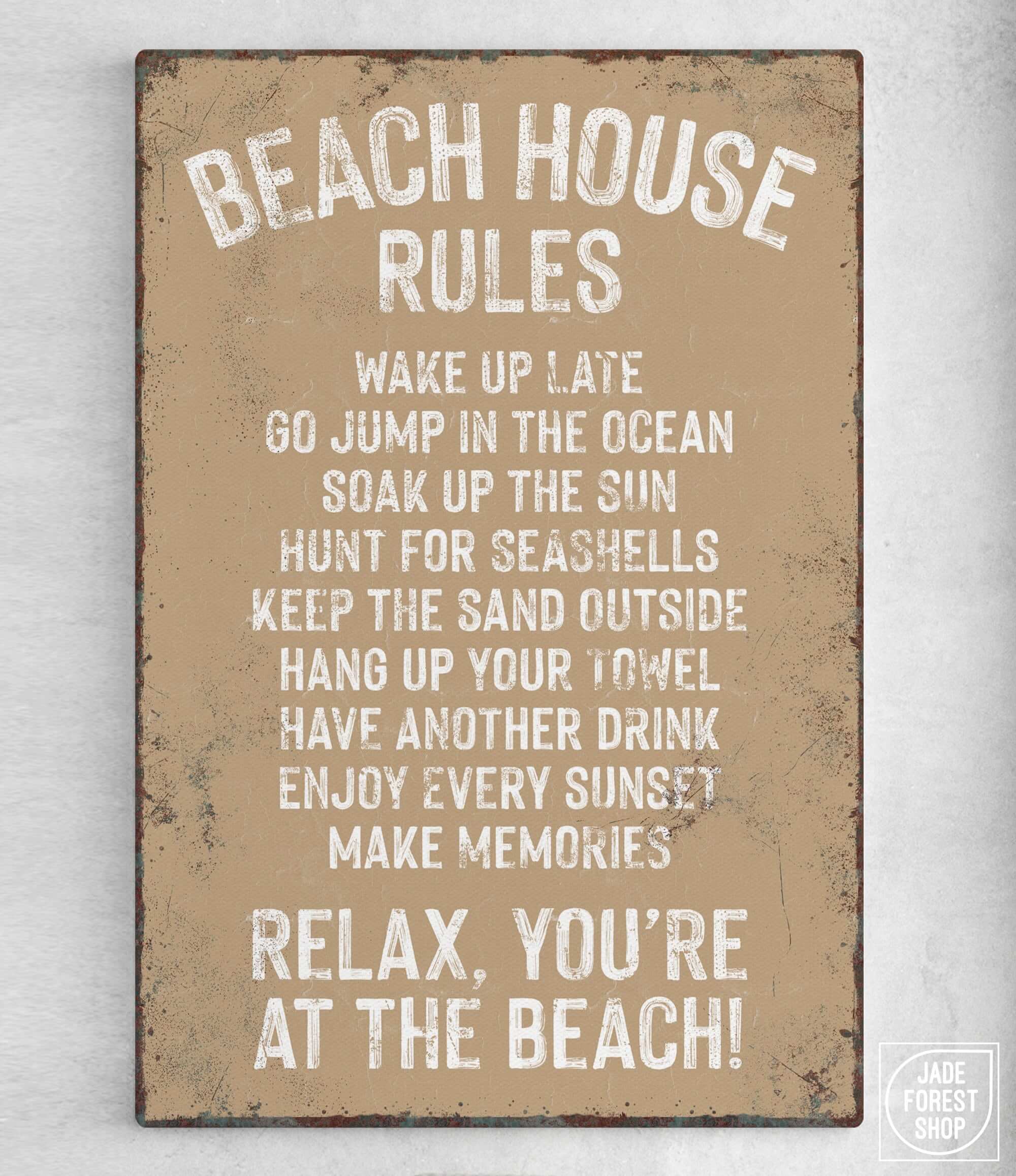 a sign on a wall that says beach house rules