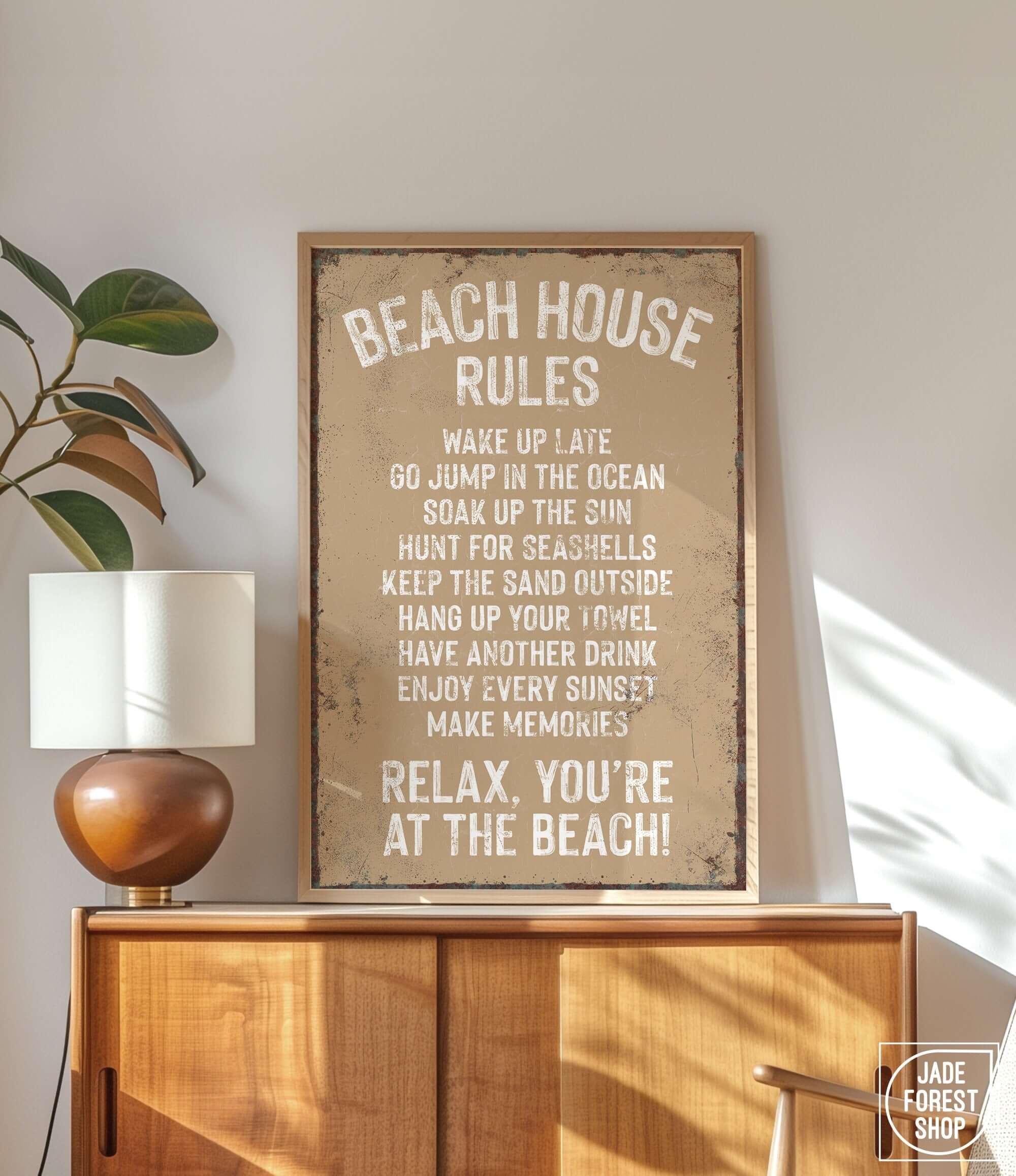 a poster on a wall above a dresser