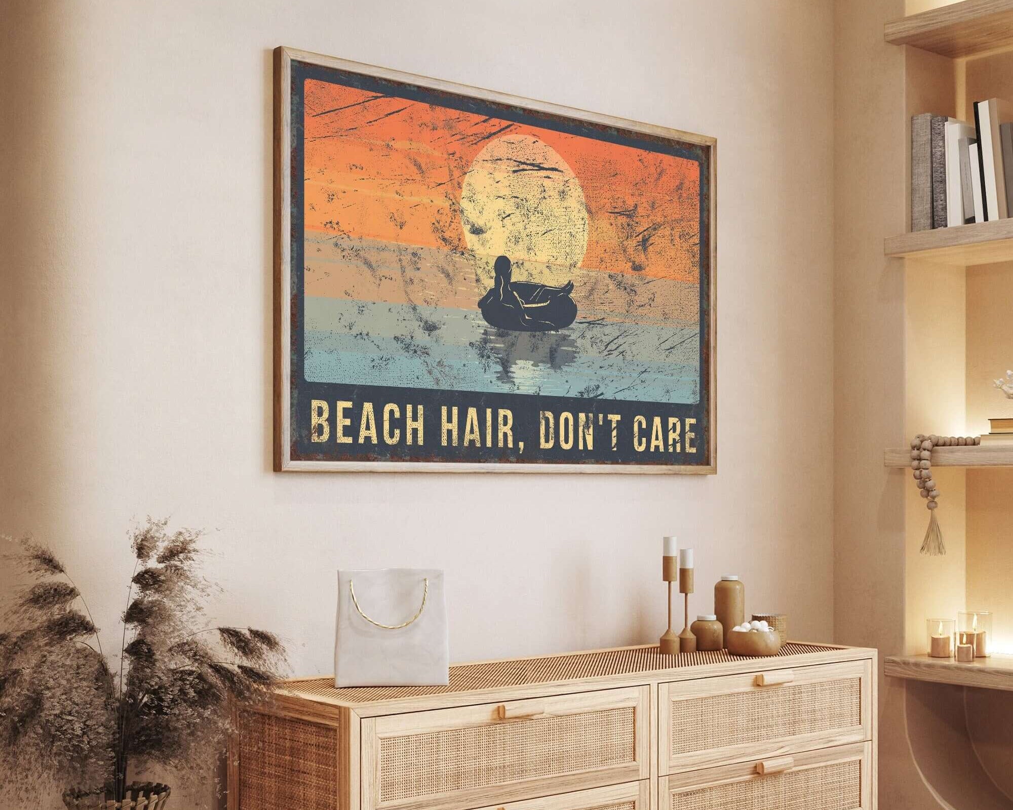 a picture of a beach hair don't care poster hanging on a wall