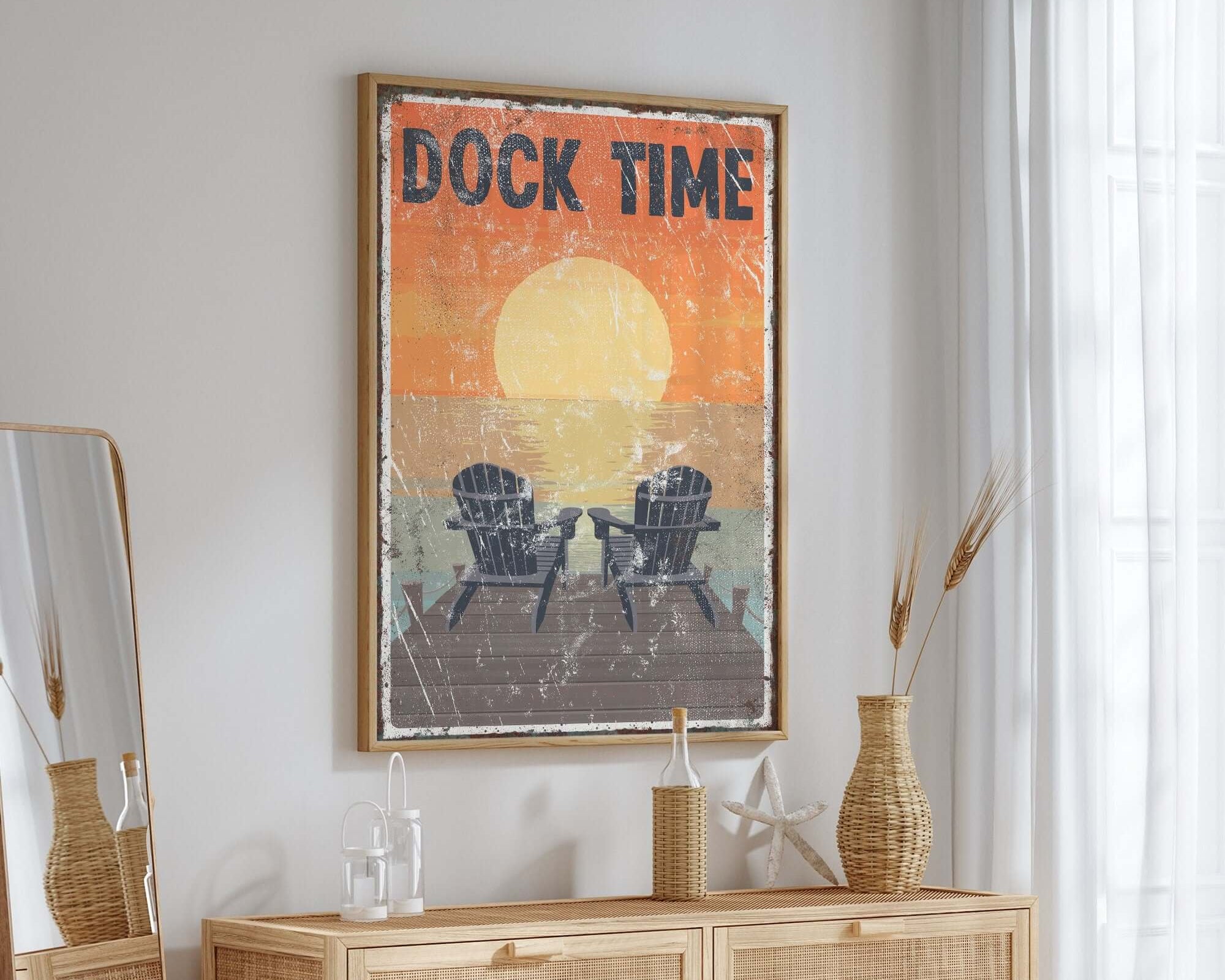 a room with a dresser, mirror and a painting on the wall