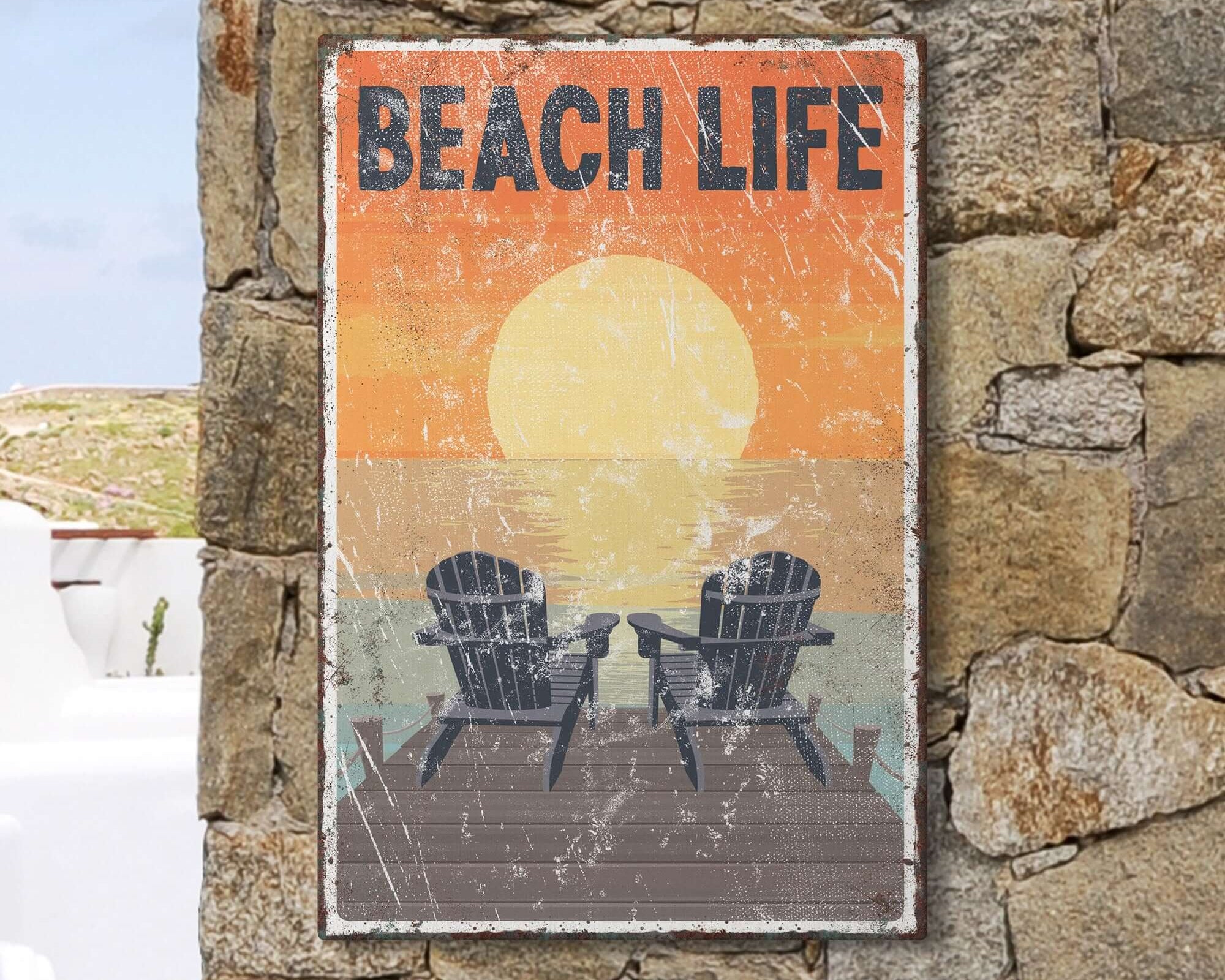 a picture of two chairs sitting in front of a stone wall