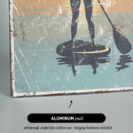 a man standing on a surfboard with a paddle