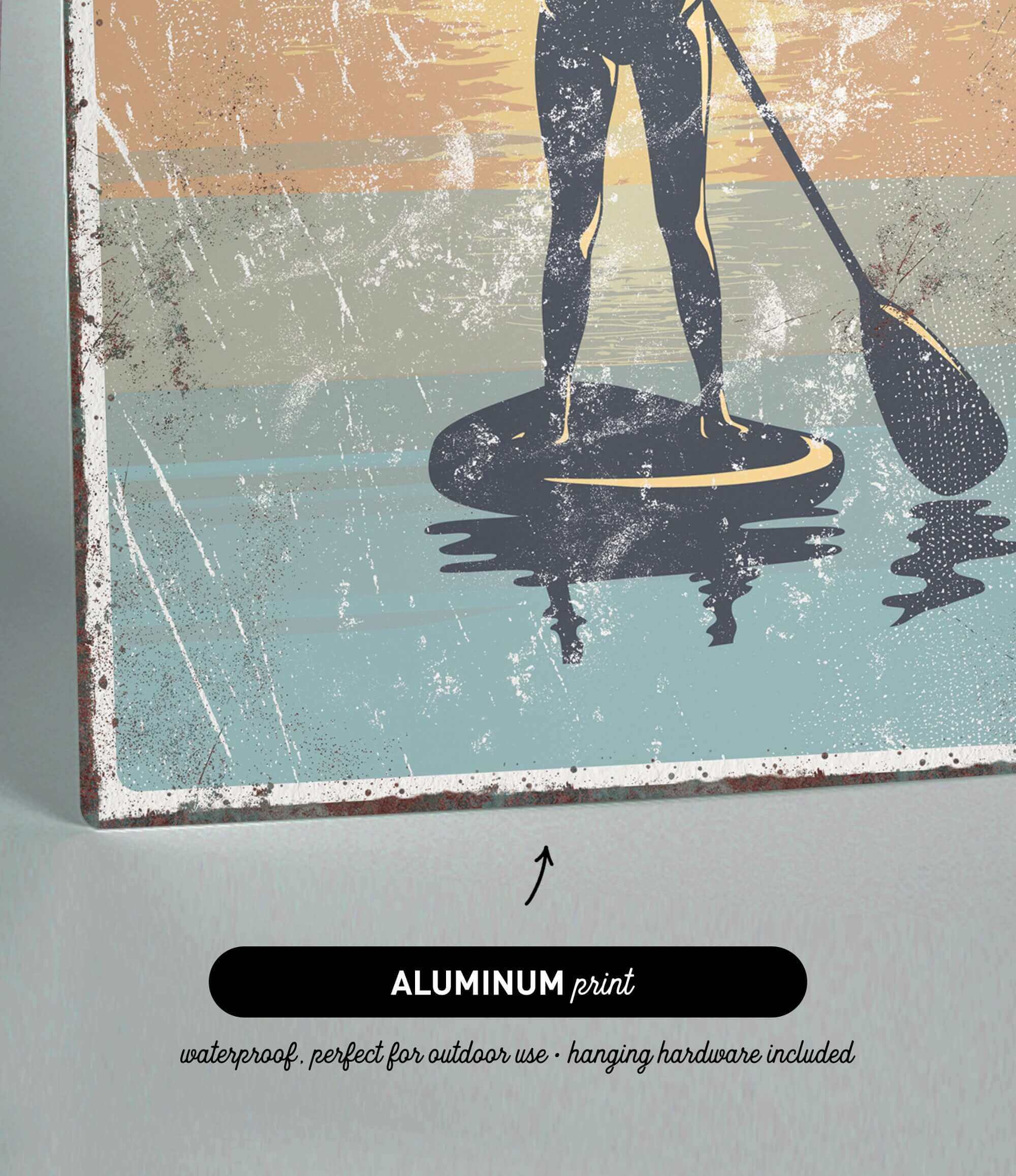 a man standing on a surfboard with a paddle