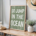 a sign that says go jump in the ocean