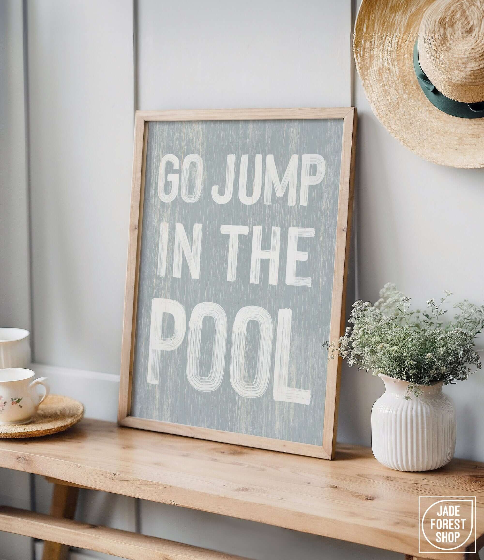 a picture of a sign that says go jump in the pool