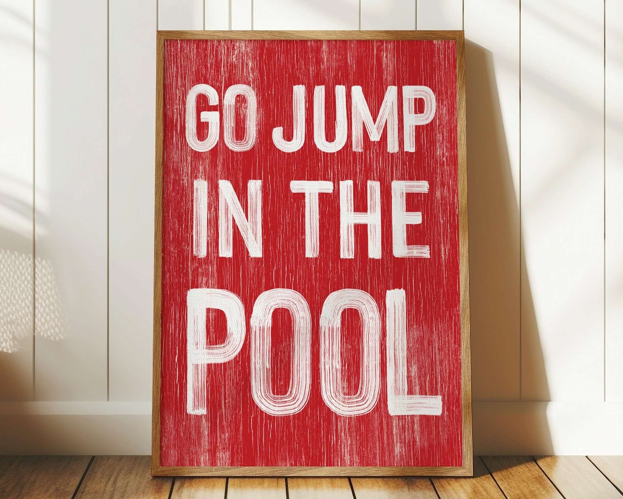 a red sign that says go jump in the pool