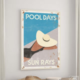 a picture of a pool days poster hanging on a wall