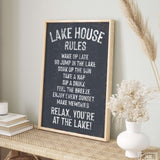 a sign that says lake house rules on a shelf