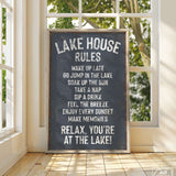 a sign on a wooden floor in front of a window