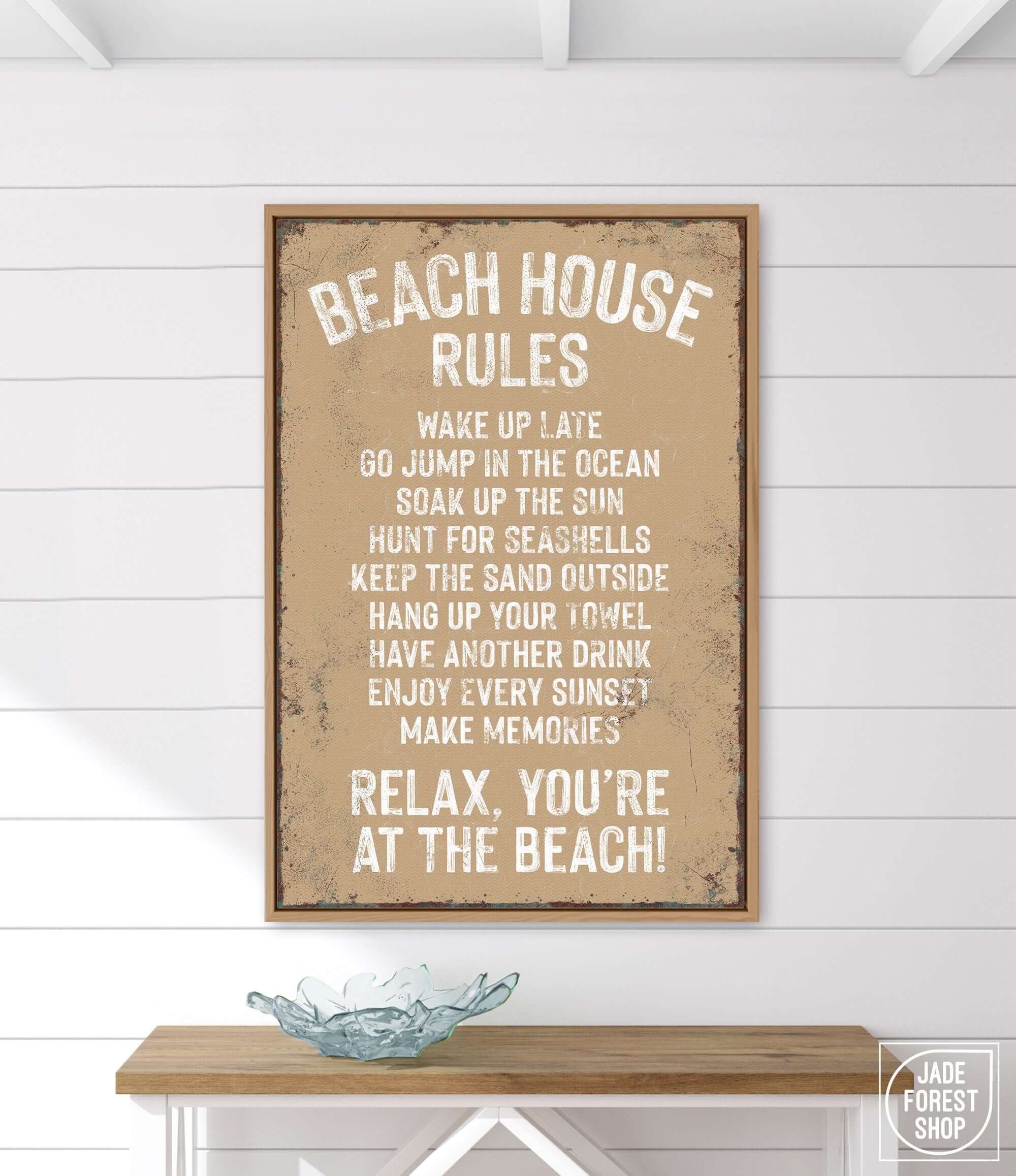 a wooden sign that reads beach house rules