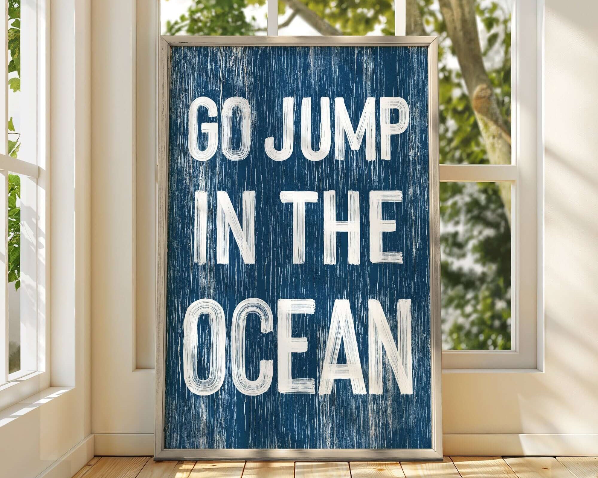 a blue sign that says go jump in the ocean
