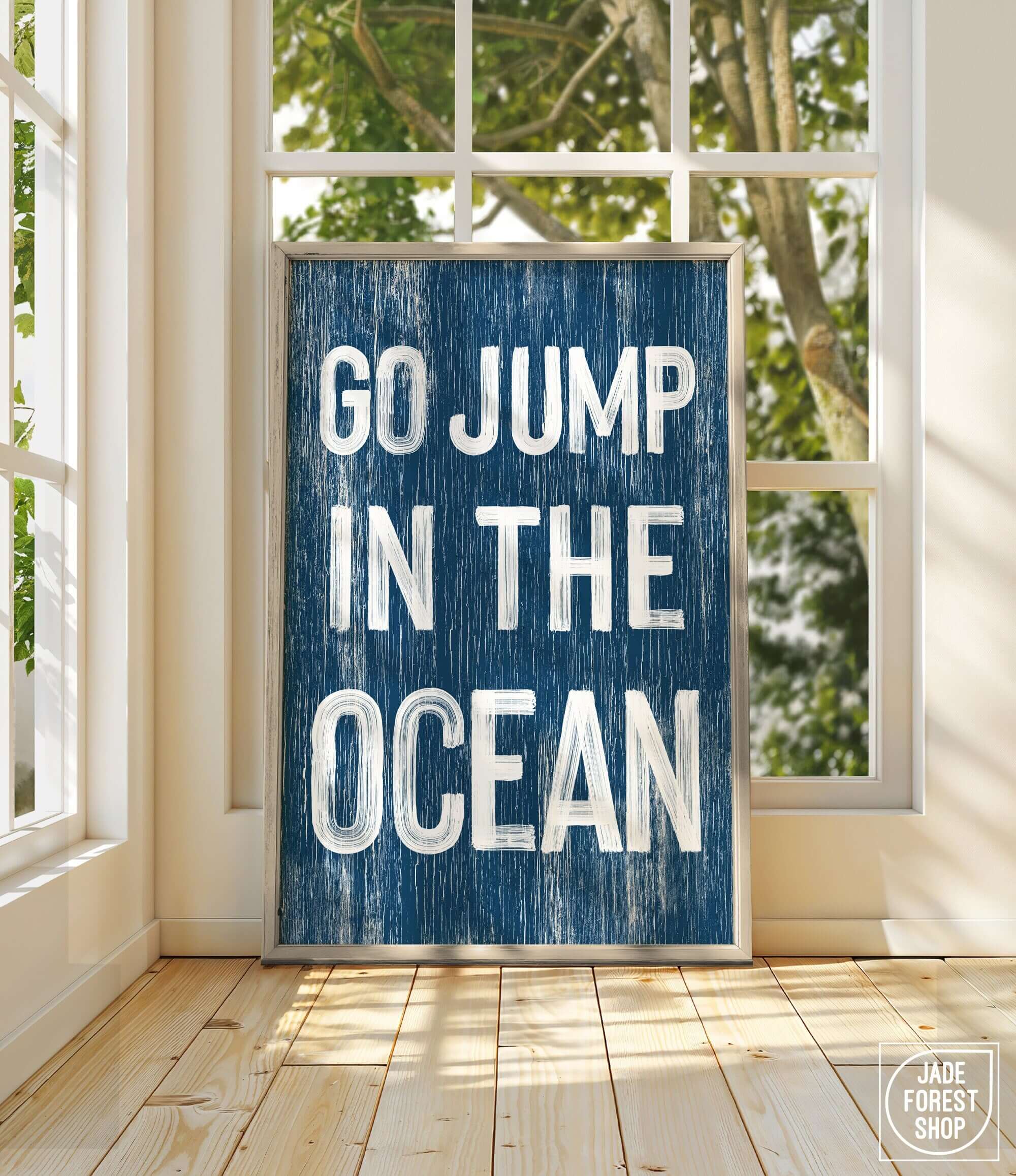 a blue sign that says go jump in the ocean