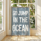 a sign that says go jump in the ocean