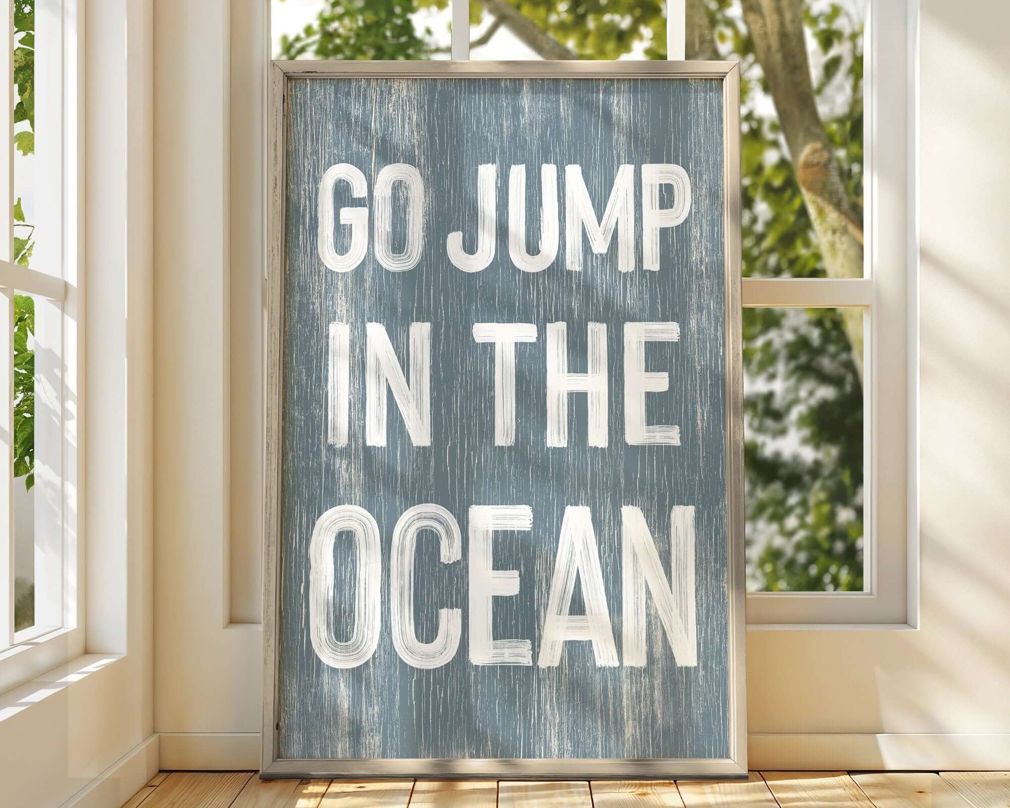a sign that says go jump in the ocean