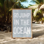 a sign that says go jump in the ocean