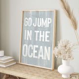 a picture of a sign that says go jump in the ocean