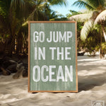 a sign that says go jump in the ocean