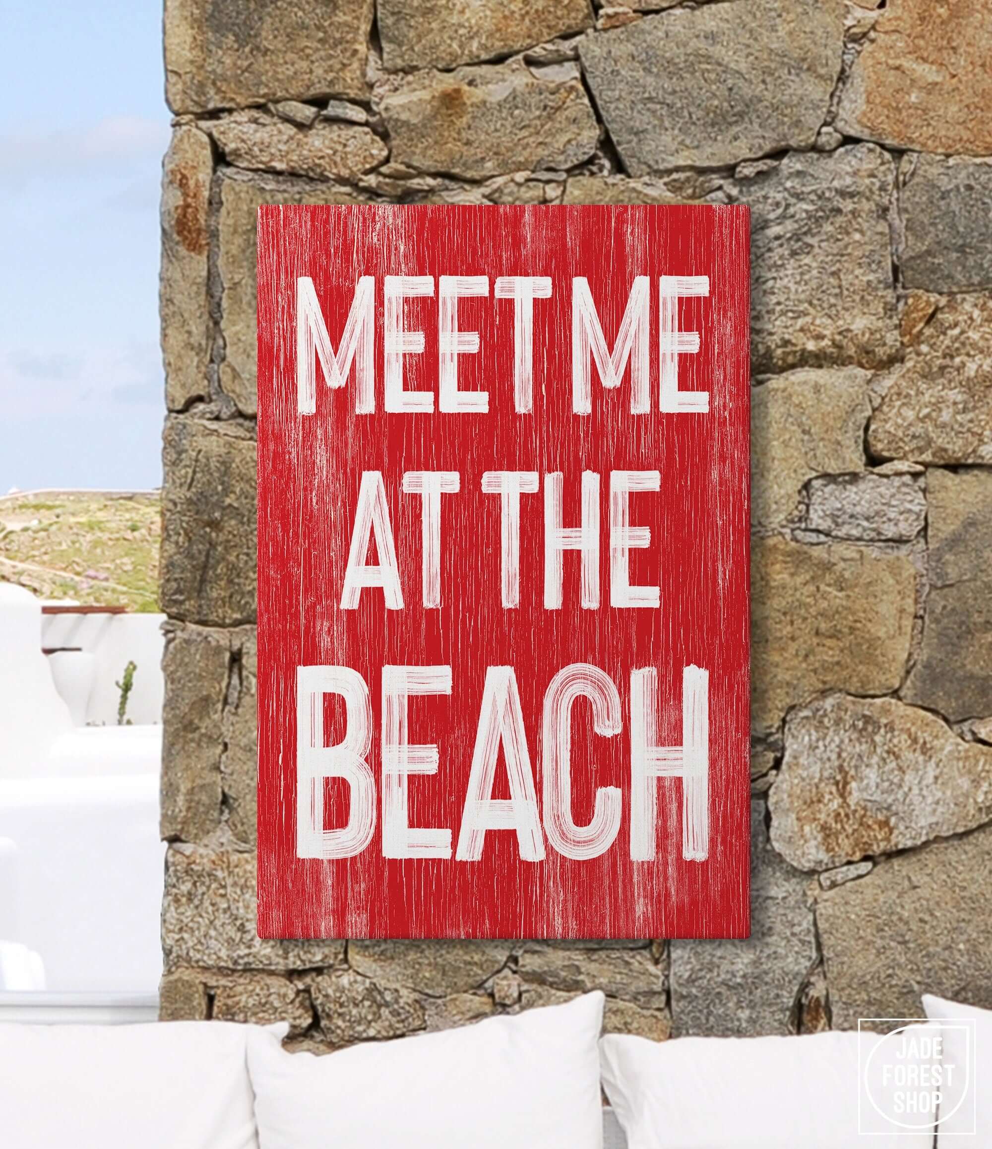 a red sign that says meet me at the beach