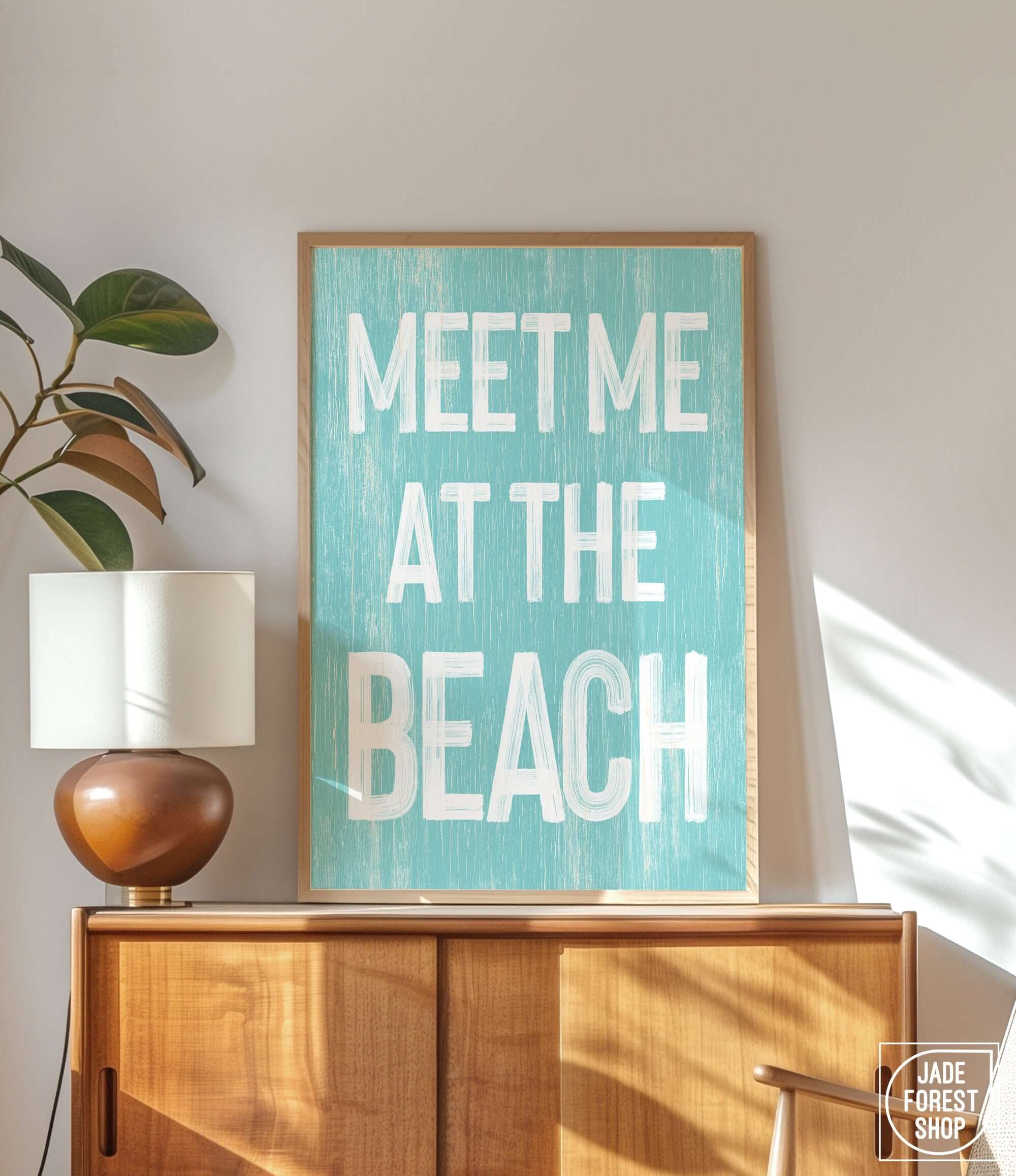 a picture of a sign that says meet me at the beach