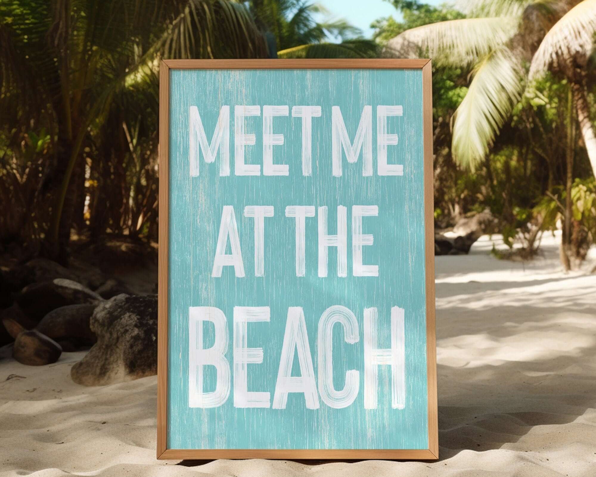 a sign that says meet me at the beach