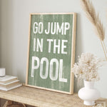 a picture of a sign that says go jump in the pool