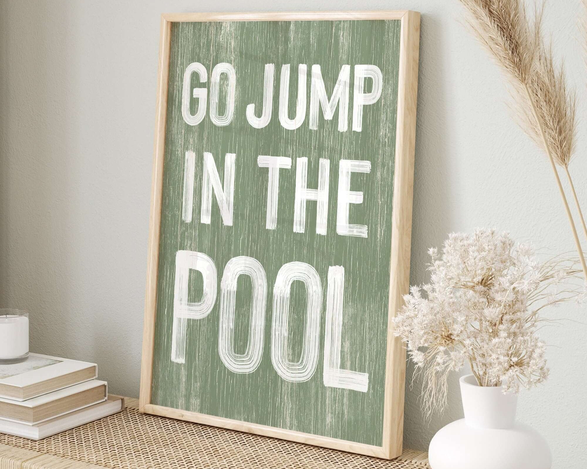 a picture of a sign that says go jump in the pool