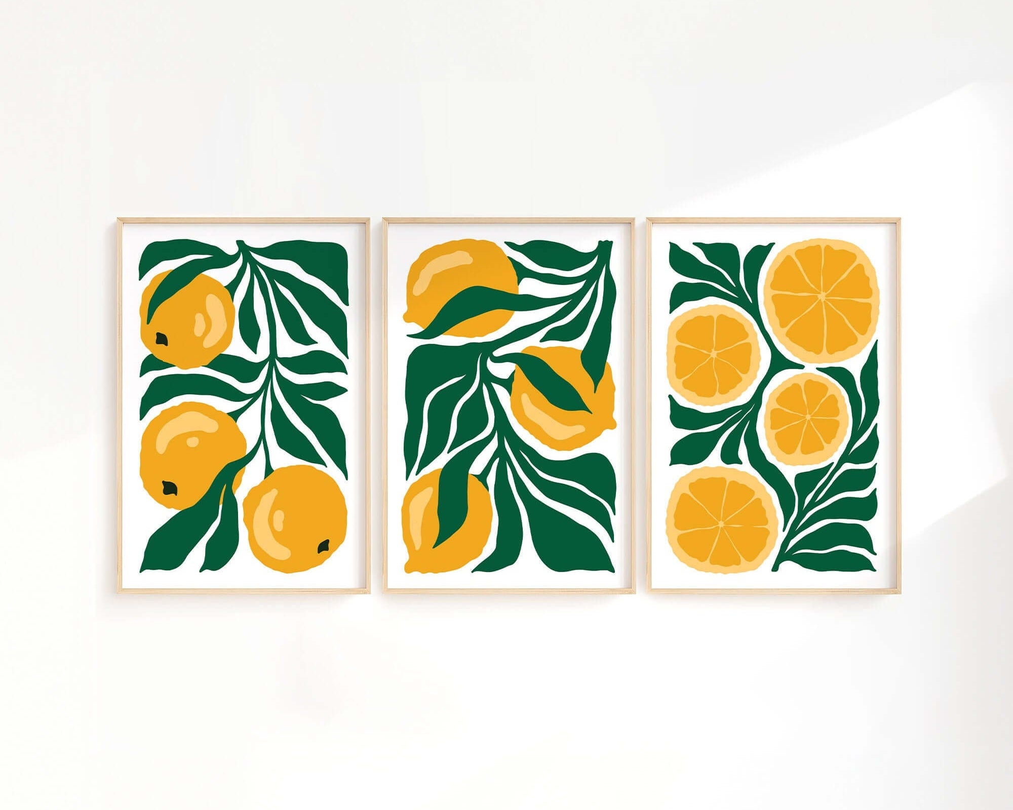 The Tropical Blocks Triptych | Set of Three Prints | 425 features bold, abstract yellow lemons with green leaves—an eye-catching collection of wall art to energize and brighten your home decor.