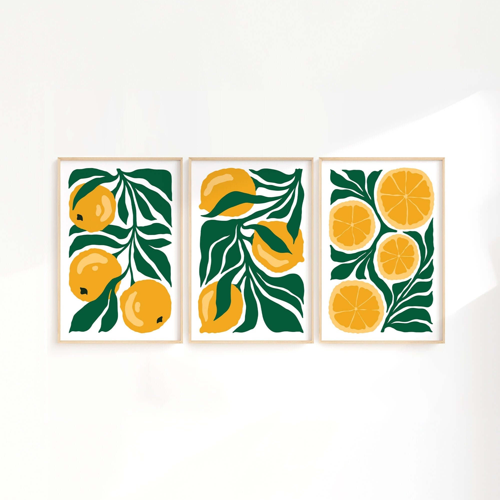The Tropical Blocks Triptych | Set of Three Prints | 425 features bold, abstract yellow lemons with green leaves—an eye-catching collection of wall art to energize and brighten your home decor.