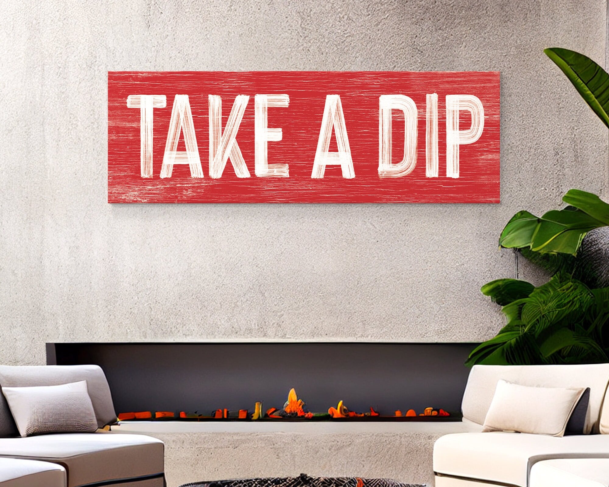 A Take a Dip Sign in Real Red hangs above a chic outdoor fire pit lounge, adding modern farmhouse style to the cozy outdoor living area.