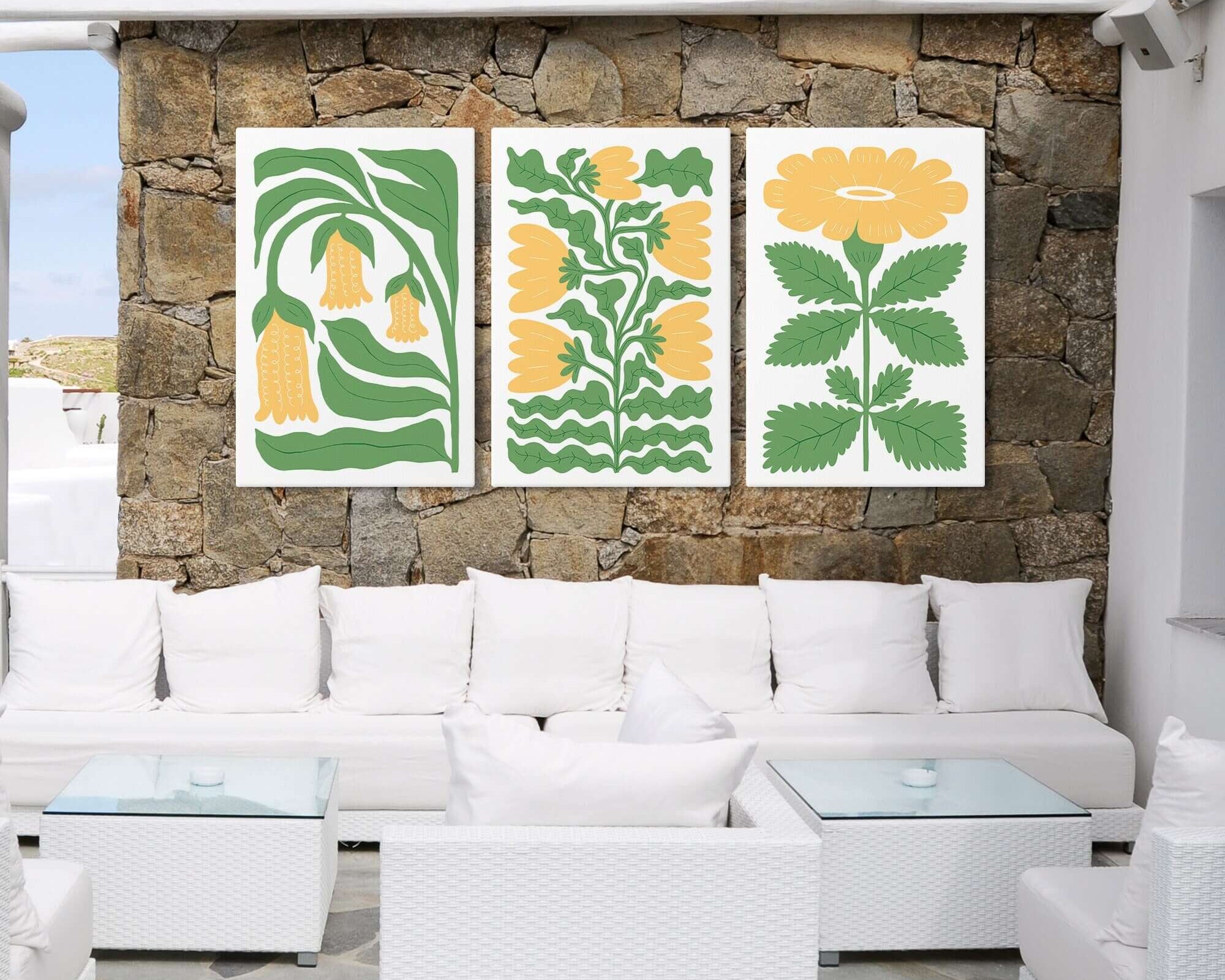 White outdoor seating area with the Tropical Blocks Triptych (Set of Three Prints | 423) displayed on a stone wall, creating vibrant and stylish home decor.
