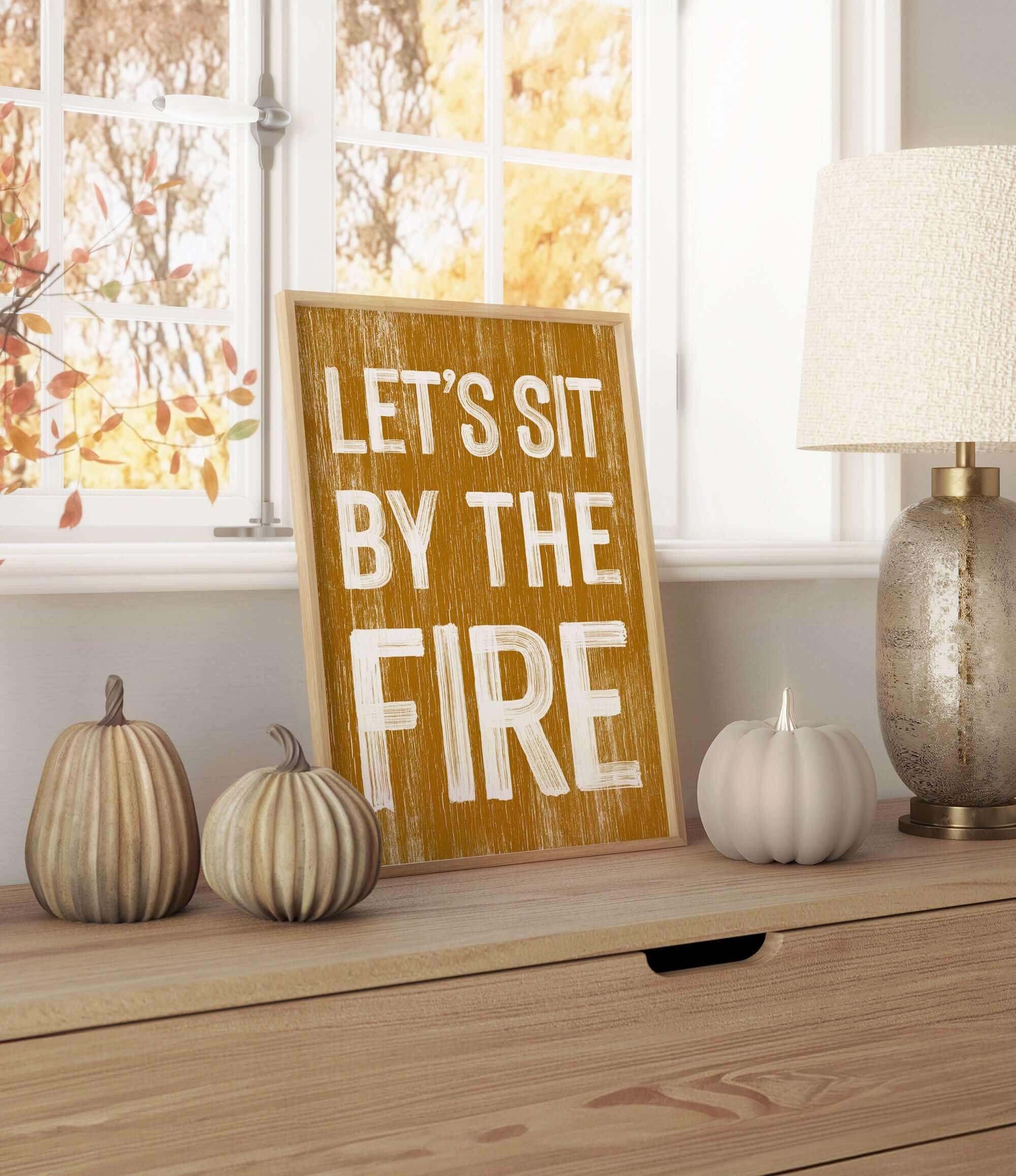 a wooden sign that says let's sit by the fire