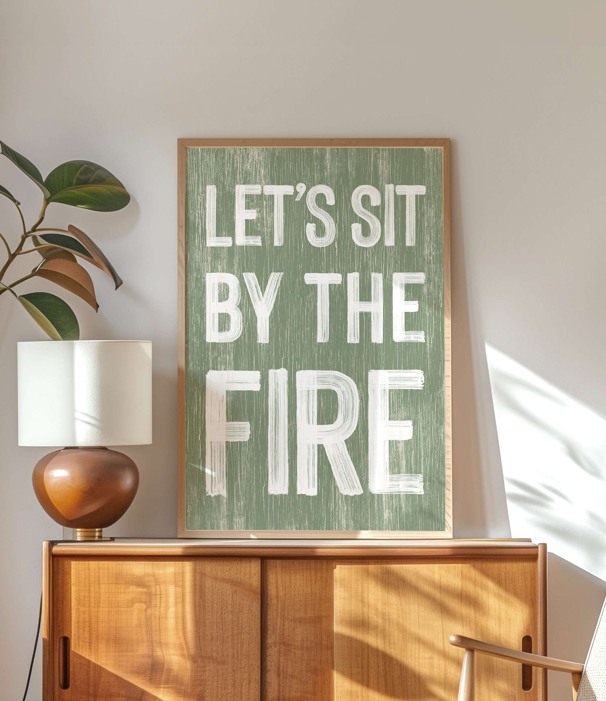 a picture of a sign that says let's sit by the fire