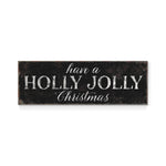 a sign that says have a holly jolly christmas